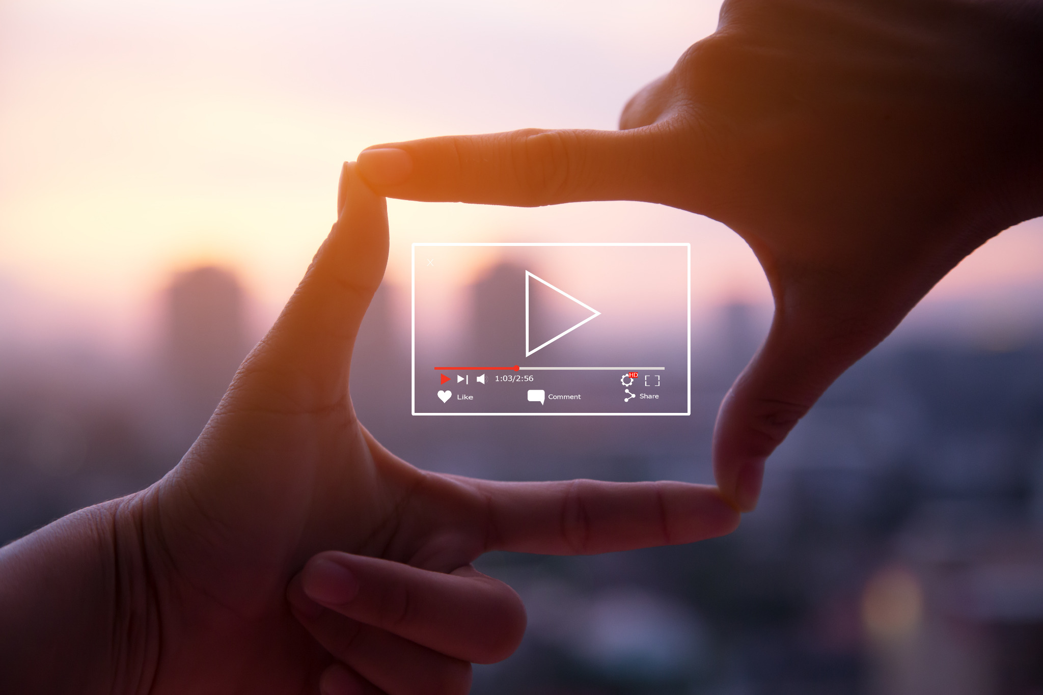 Hands framing a digital video experience